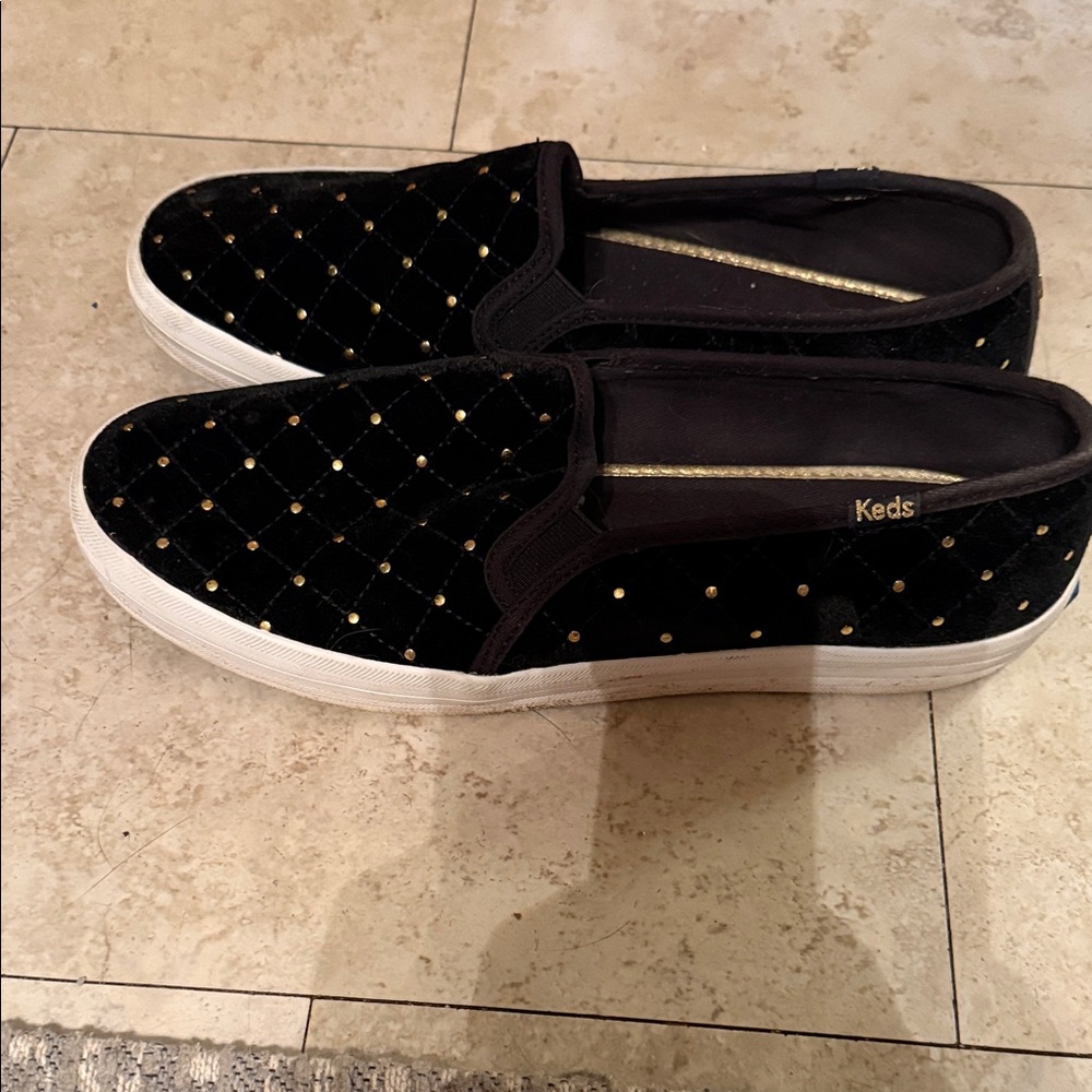 Keds Black and Gold Quilted Slip-On Sneakers